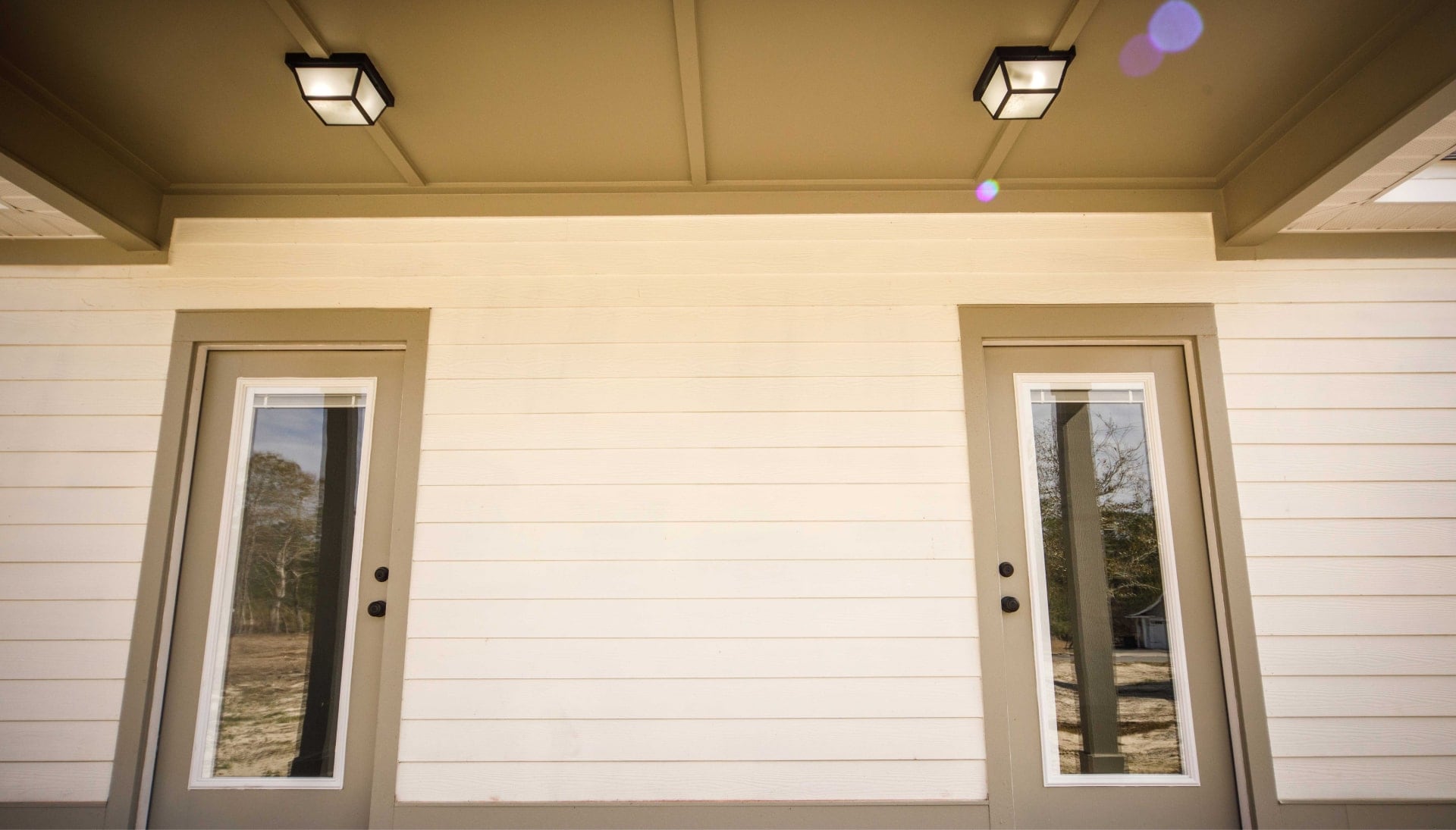 We offer siding services in Toledo, Ohio. Hardie plank siding installation in a front entry way.